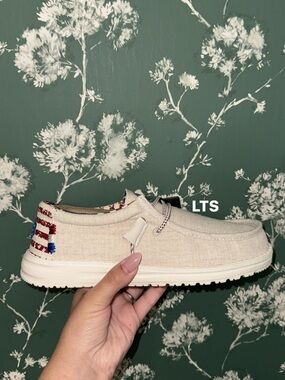 Hey Dude Slip-On Linen Shoe in Natural Beige with Red & Blue Flag Accent